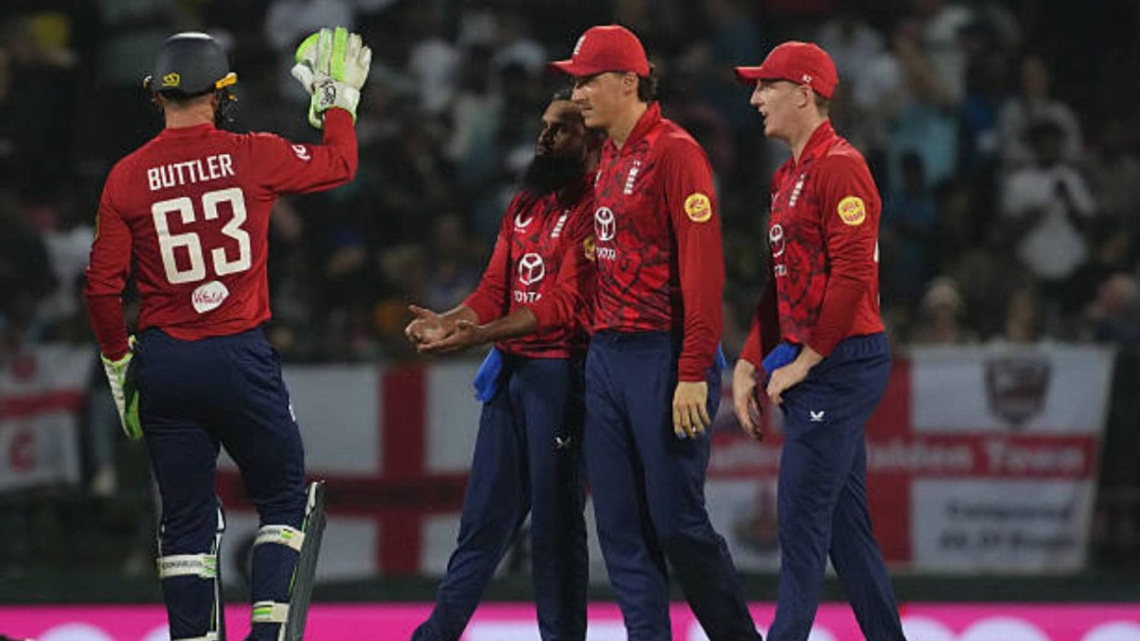 Adil Rashid and Phil Salt power England to comfortable victory in 1st T20I against Sri Lanka Adil Rashid (C) of England celebrates the wicket of Kusal Mendis (not in picture) of Sri Lanka with teammates during the 1st International T20 match between Sri Lanka and England (via Getty)