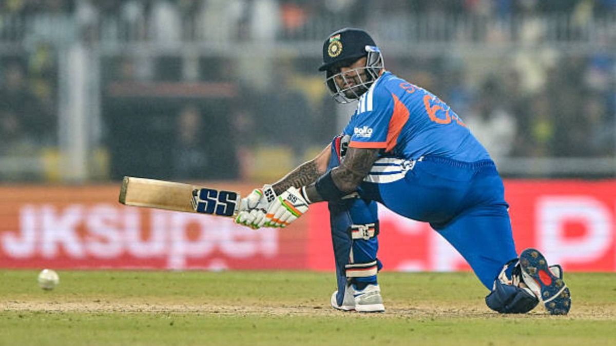 India's captain Suryakumar Yadav watches the ball after playing a shot during the third Twenty20 international cricket match between India and New Zealand at the Barsapara Cricket Stadium in Guwahati (via Getty)