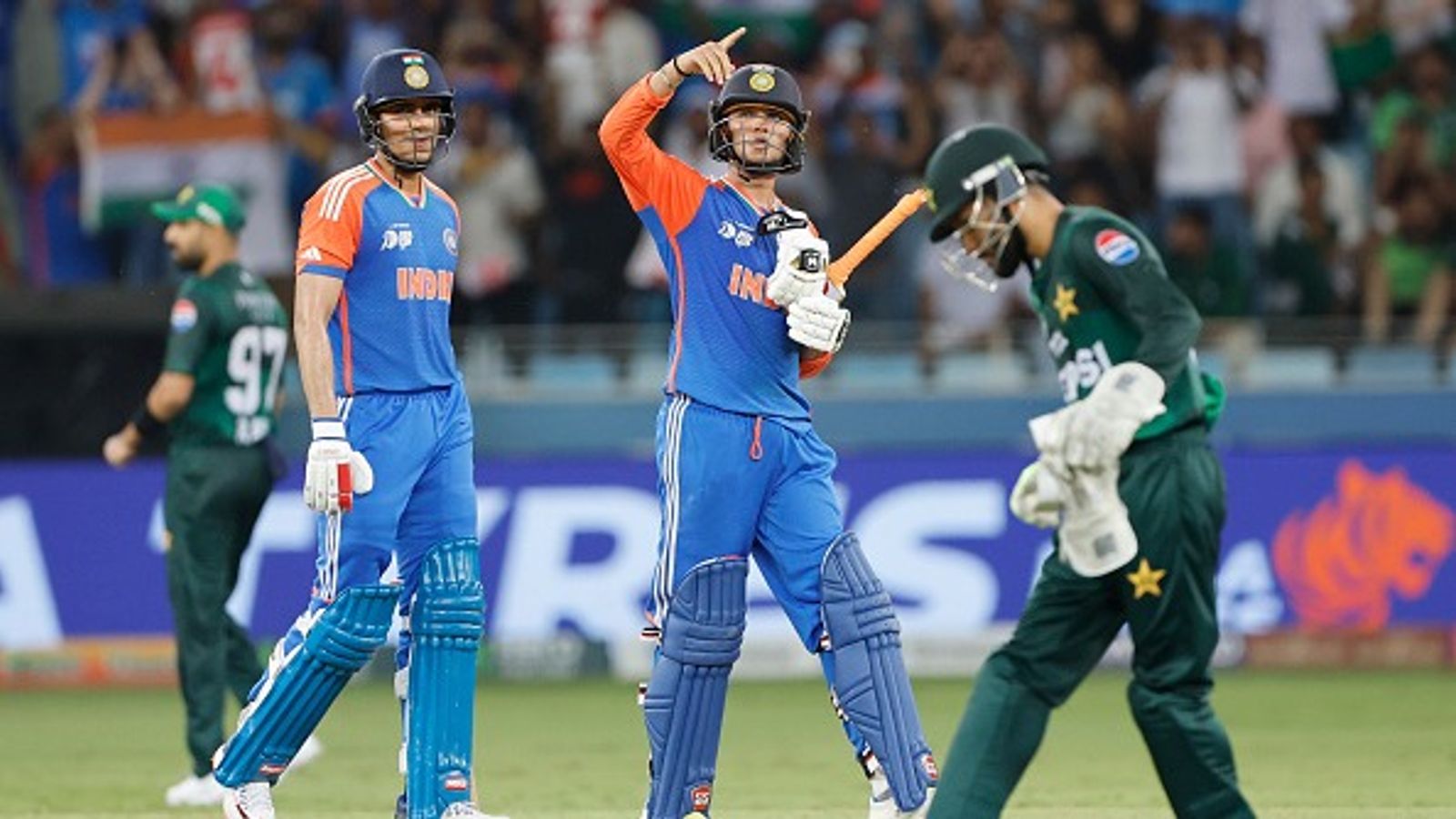 'PCB will reverse their boycott': Ravichandran Ashwin's bold prediction on India vs Pakistan T20 World Cup 2026 clash goes viral Abhishek Sharma of India (C) celebrates fifty runs with Shubman Gill of India during the match between India and Pakistan at Dubai International Stadium (Getty)