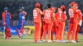 Delhi Capitals' Lizelle Lee (L) and Shafali Verma (2L) look on as Gujarat Giants' players appeal for a DRS (decision review system) against Lee during the Women's Premier League (WPL) Twenty20 cricket eliminator match Delhi Capitals' Lizelle Lee (L) and Shafali Verma (2L) look on as Gujarat Giants' players appeal for a DRS (decision review system) against Lee during the Women's Premier League (WPL) Twenty20 cricket eliminator match