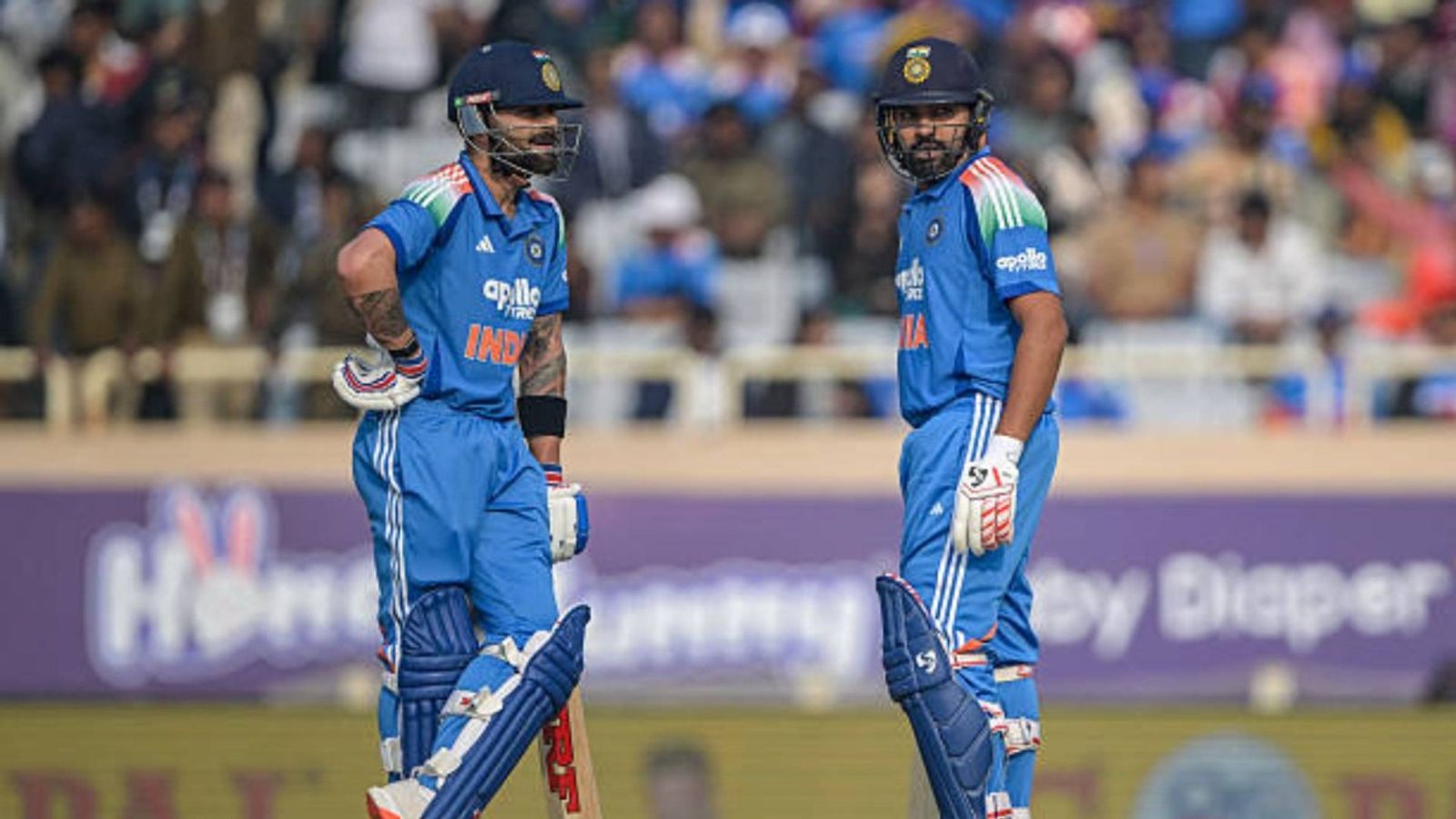 'Age is not a criteria...': MS Dhoni's honest take on Rohit Sharma and Virat Kohli's 2027 World Cup spot India's Virat Kohli (L) and Rohit Sharma gesture during the first one-day international (ODI) cricket match between India and South Africa at the JSCA International Stadium in Ranchi (via Getty)
