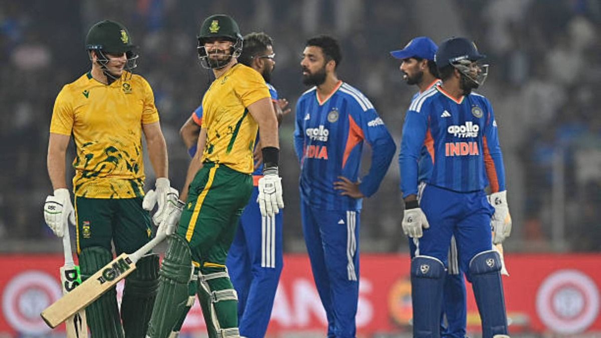 South Africa's captain Aiden Markram (2L) reacts as India's team players celebrate after his dismissal during the fifth Twenty20 international cricket match between India and South Africa at the Narendra Modi Stadium (via Getty)