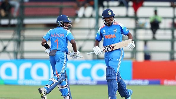 Aaron George and Ayush Mhatre of India interact during the ICC U19 Men's Cricket World Cup 2026 Semi-Final match between India and Afghanistan at Harare Sports Club on February 04, 2026 in Harare