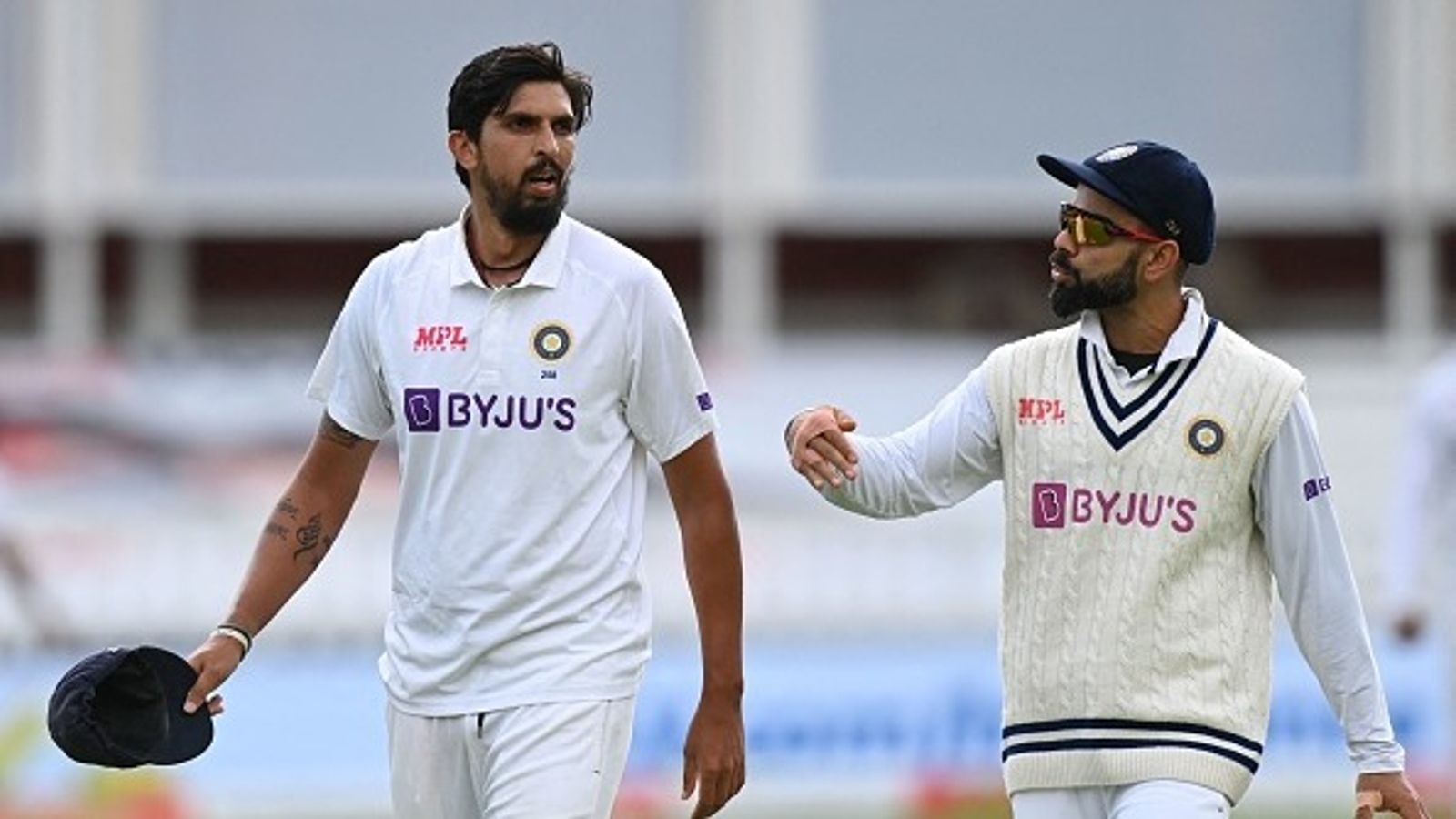 Exclusive: Ishant Sharma explains India's pace bowling growth under Virat Kohli's captaincy Ishant Sharma (L) talks with India's captain Virat Kohli (R) on the second day of the second cricket Test match between England and India at Lord's cricket ground in London on August 13, 2021 (Getty)