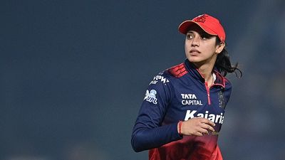 ‘Played game with Massive, Massive Flu’: RCB coach makes huge revelation on Smriti Mandhana after RCB's WPL 2026 win Smriti Mandhana looks on during the Women's Premier League (WPL) Twenty20 final cricket match between Delhi Capitals and Royal Challengers Bengaluru (Getty)