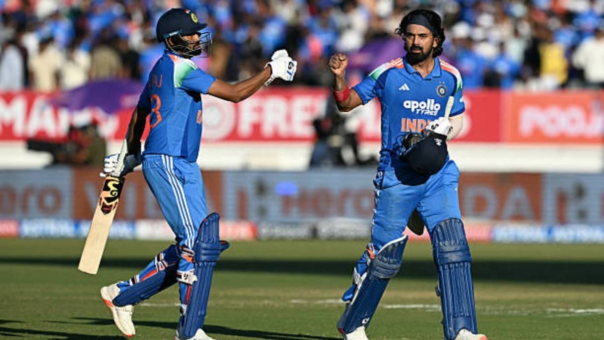 India's KL Rahul and Mohammed Siraj bump fists as they walk back to the pavilion after first innings during the second one-day international (ODI) cricket match between India and New Zealand (via Getty)