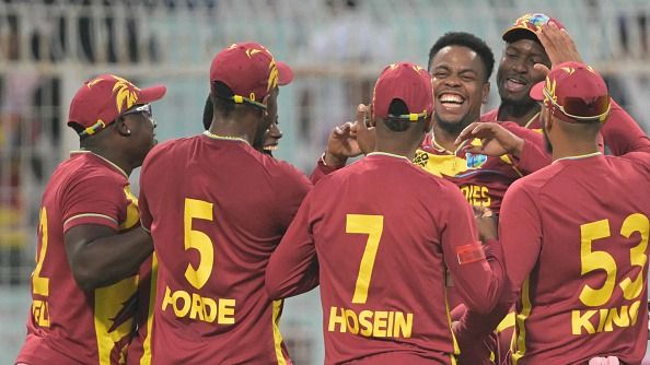 West Indies' Shimron Hetmyer (3R) celebrates with teammates after taking the wicket (Getty)