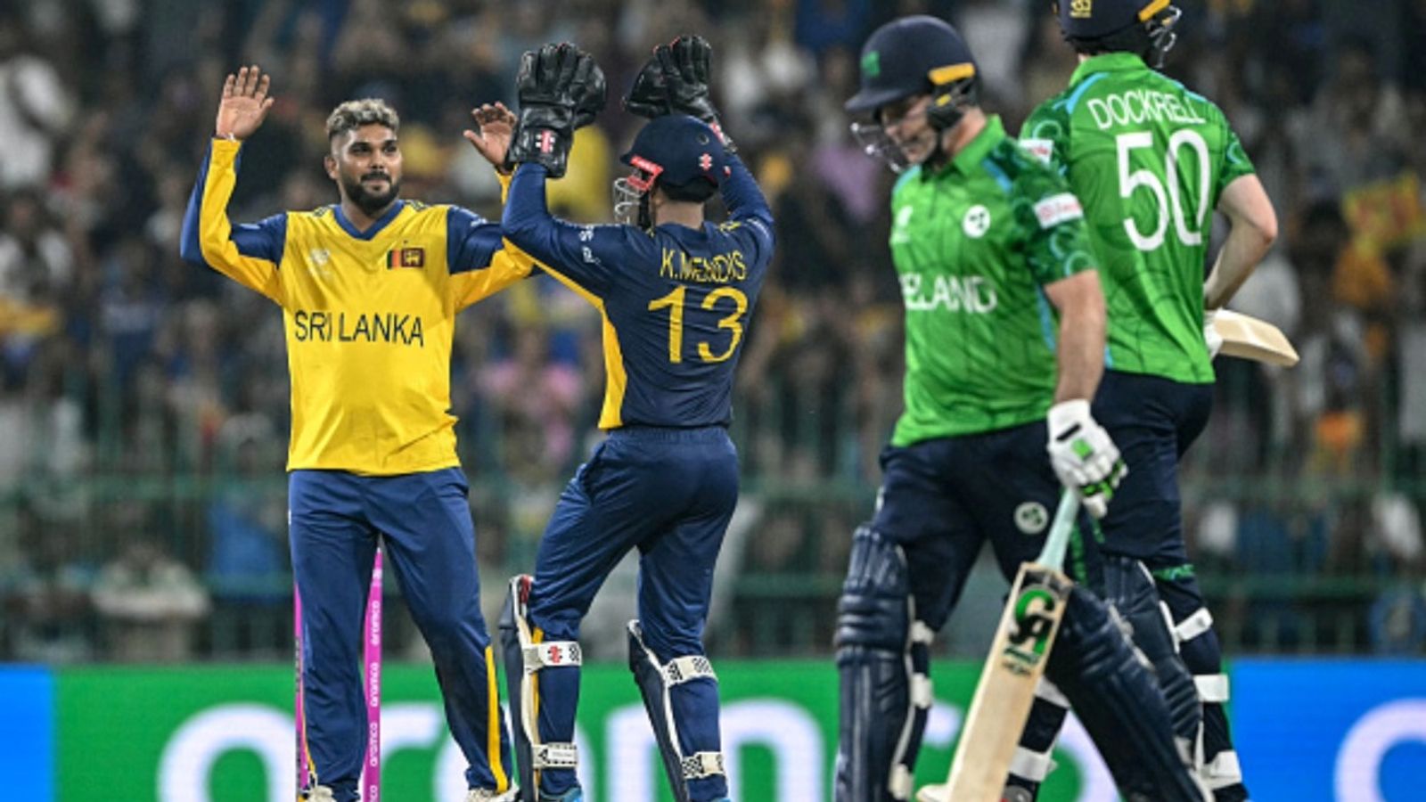Hasaranga leaves Afridi behind, only behind this legend on T20 World Cup's all-time highest wicket-taker list Sri Lanka's Wanindu Hasaranga (L) celebrates with teammate Kusal Mendis (2L) after taking the wicket of Ireland's Curtis Campher (2R) during the 2026 ICC Men's T20 World Cup group stage match at the R Premadasa Stadium in Colombo on February 8, 2026.