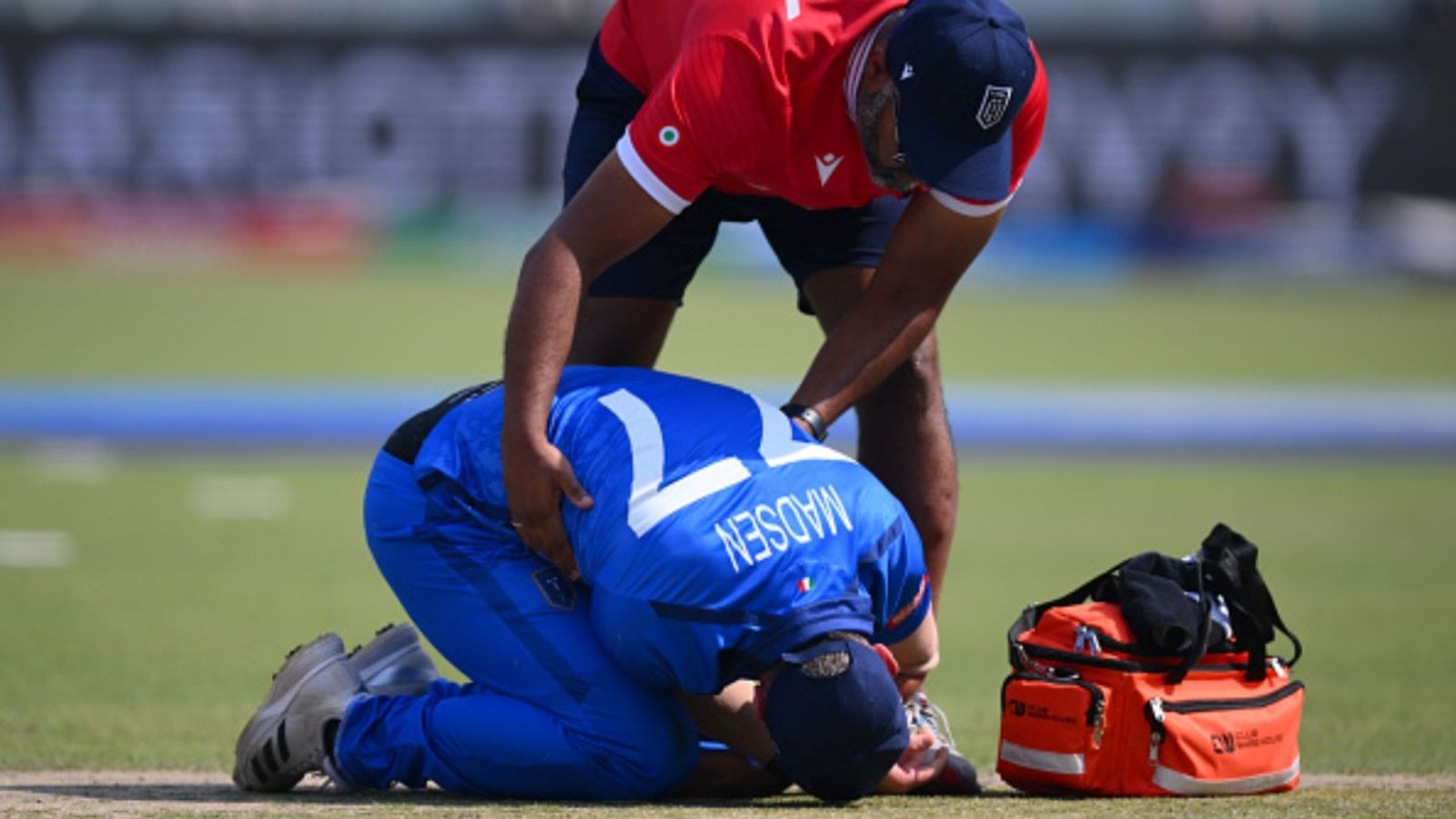 Italy's 42-yr-old captain dives and dislocates shoulder, leaves field wincing in pain on T20 World Cup debut Wayne Madsen of Italy receives treatment after diving for a catch during the ICC Men's T20 World Cup 2026 match against Scotland at Eden Gardens on February 09, 2026 in Kolkata.