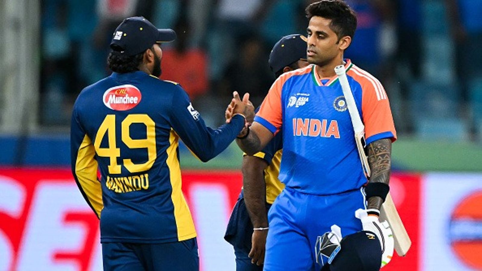 Big blow to T20 World Cup 2026 host team, star player ruled out of remainder of tournament India's captain Suryakumar Yadav (R) shakes hands with Sri Lanka's Wanindu Hasaranga in this frame. (Getty)