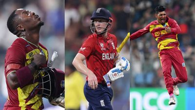 T20 World Cup: Rutherford-Motie's exploits rock England as West Indies notch handsome 30-run win West Indies' Sherfane Rutherford (L), Gudakesh Motie (R) and England's Harry Brook in frame. (Getty)