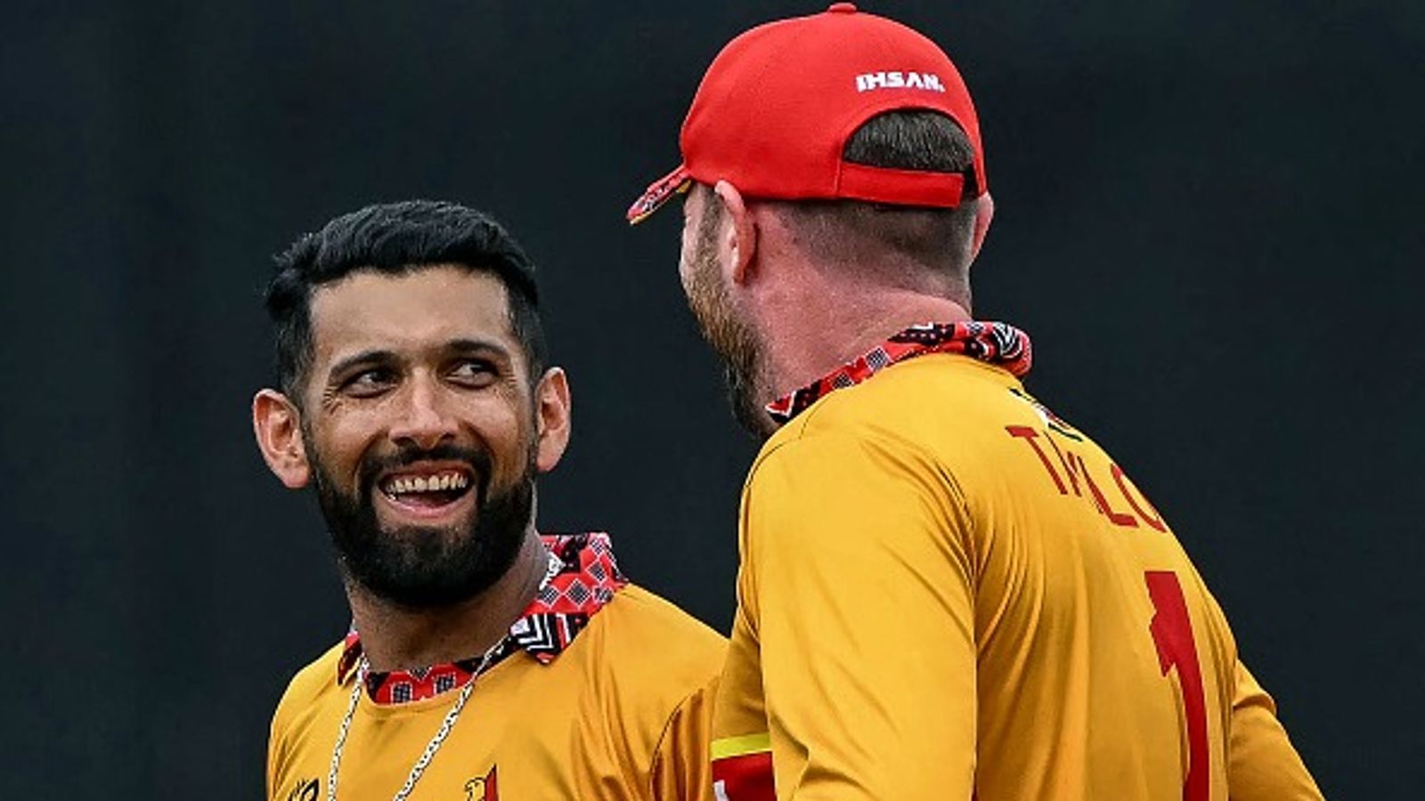 Sikandar Raza speaks his heart out after Zimbabwe land painful T20 World Cup upset to Australia Zimbabwe's captain Sikandar Raza (L) speaks with his teammate in this frame. (Getty)