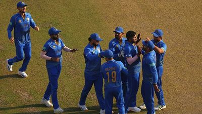 T20 World Cup: Junaid's 5-fer, Aryansh's gritty 74 help UAE script thrilling 5-wicket win over Canada UAE's Junaid Siddique (C) celebrates with his teammates in this frame. (Getty)