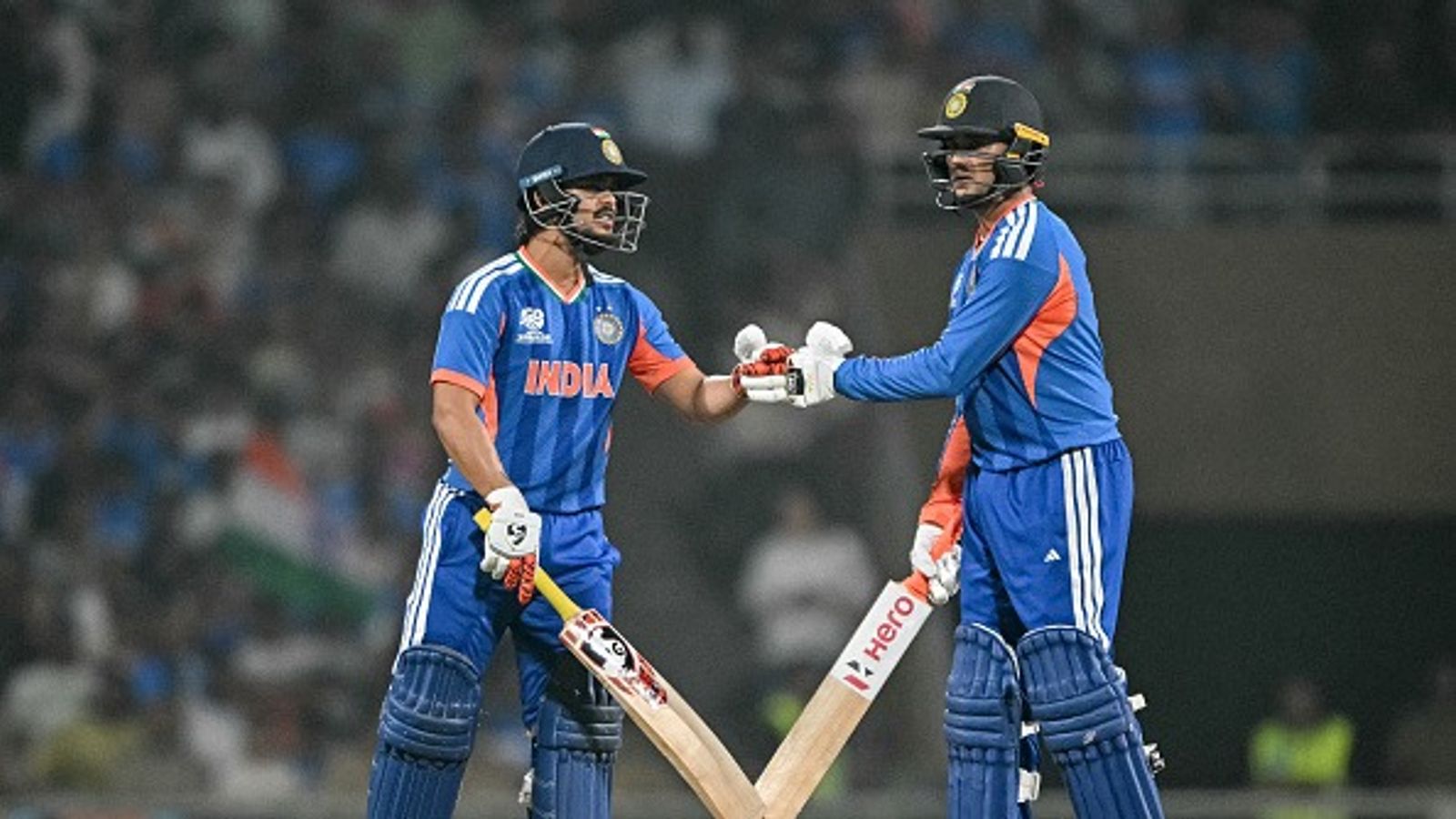 Not Abhishek or Ishan, Ex-England star picks these stars as India’s biggest threats to Pakistan in T20 World Cup 2026 Ishan Kishan (L) and Abhishek Sharma bump their fists during the 2026 ICC Men's T20 Cricket World Cup (getty)