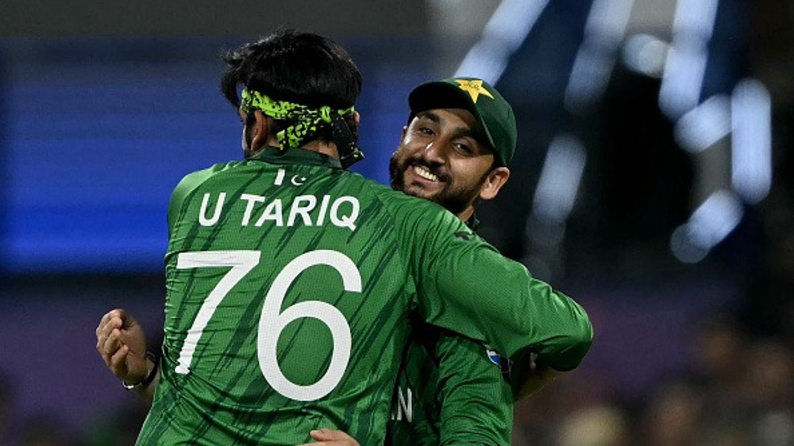 IND vs PAK: Salman Ali Agha breaks silence on Usman Tariq's bowling action controversy, labels him ‘Trump Card’ Pakistan's Usman Tariq celebrates with captain Salman Agha after taking the wicket of USA's Mohammad Mohsin during the 2026 ICC Men's T20 Cricket World Cup group stage match between Pakistan and USA (Getty)