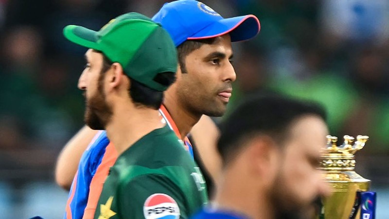Suryakumar Yadav addresses buzz over India-Pakistan handshake ahead of T20 World Cup showdown India's captain Suryakumar Yadav (C-back) walks past his Pakistani counterpart Salman Agha in this frame. (Getty)