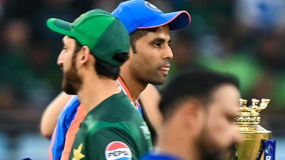Suryakumar Yadav addresses buzz over India-Pakistan handshake ahead of T20 World Cup showdown India's captain Suryakumar Yadav (C-back) walks past his Pakistani counterpart Salman Agha in this frame. (Getty)