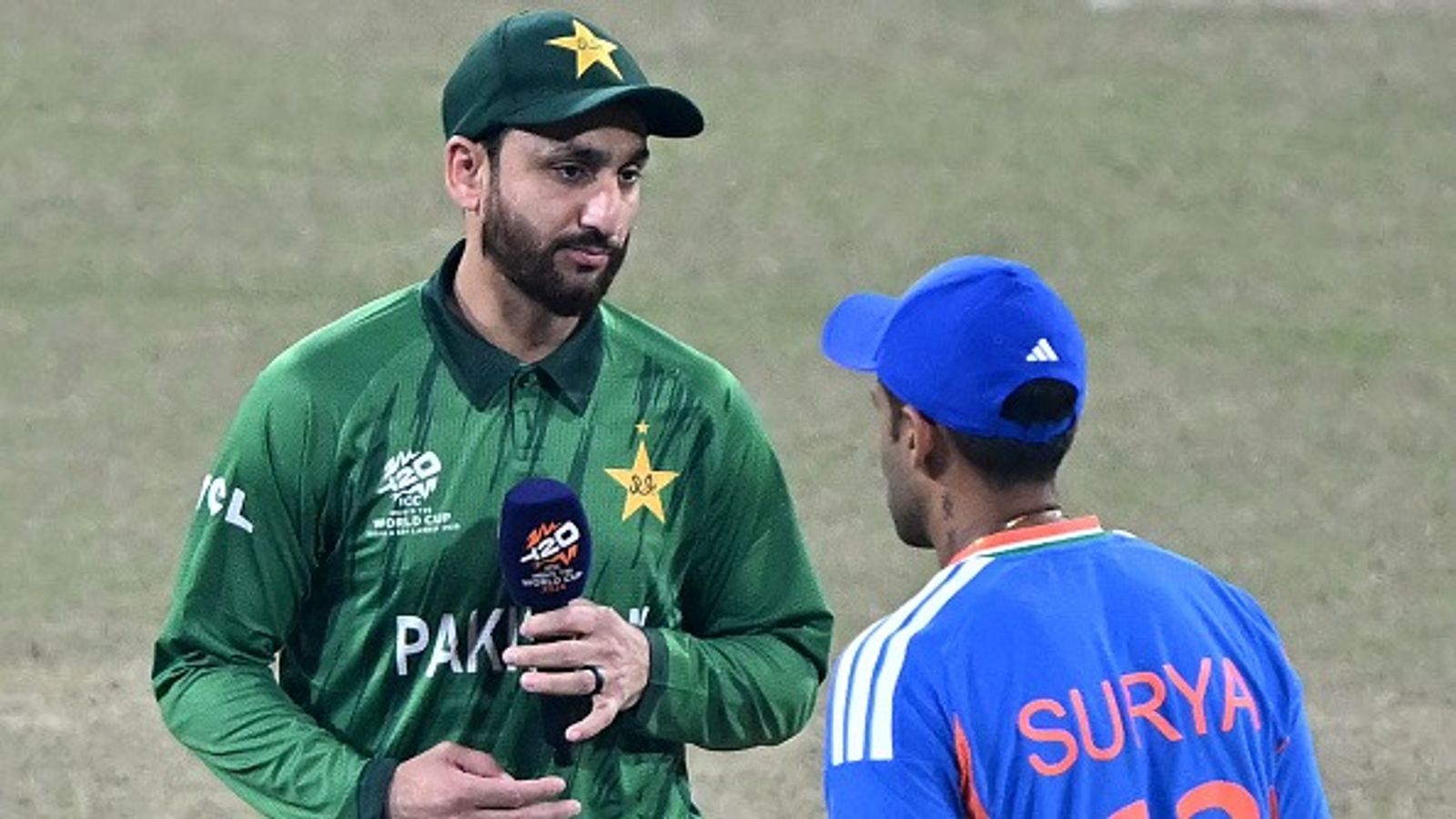 IND vs PAK: India continue no-handshake stance vs Pakistan at T20 World Cup, Here's how the two captains reacted Pakistan's captain Salman Agha (L) walks past India skipper Suryakumar Yadav in this frame. (Getty)