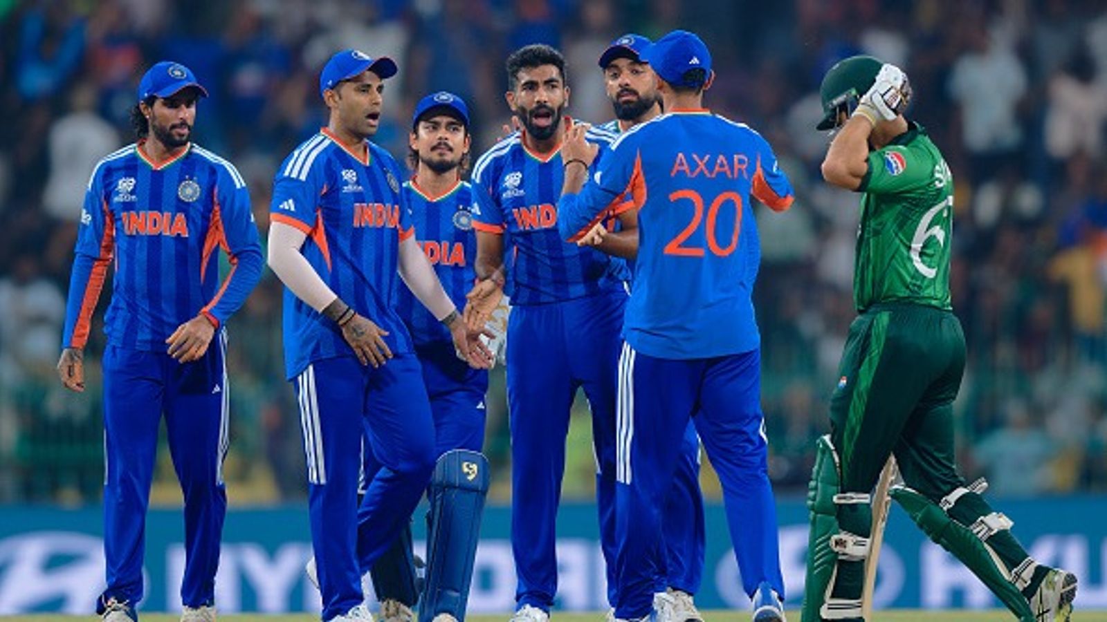 Watch: Jasprit Bumrah's lethal yorker floors Saim Ayub, followed by Icy send-off in IND vs PAK clash India's Jasprit Bumrah (C) celebrates with his teammates the wicket of Pakitan's Saim Ayub in this frame. (Getty)
