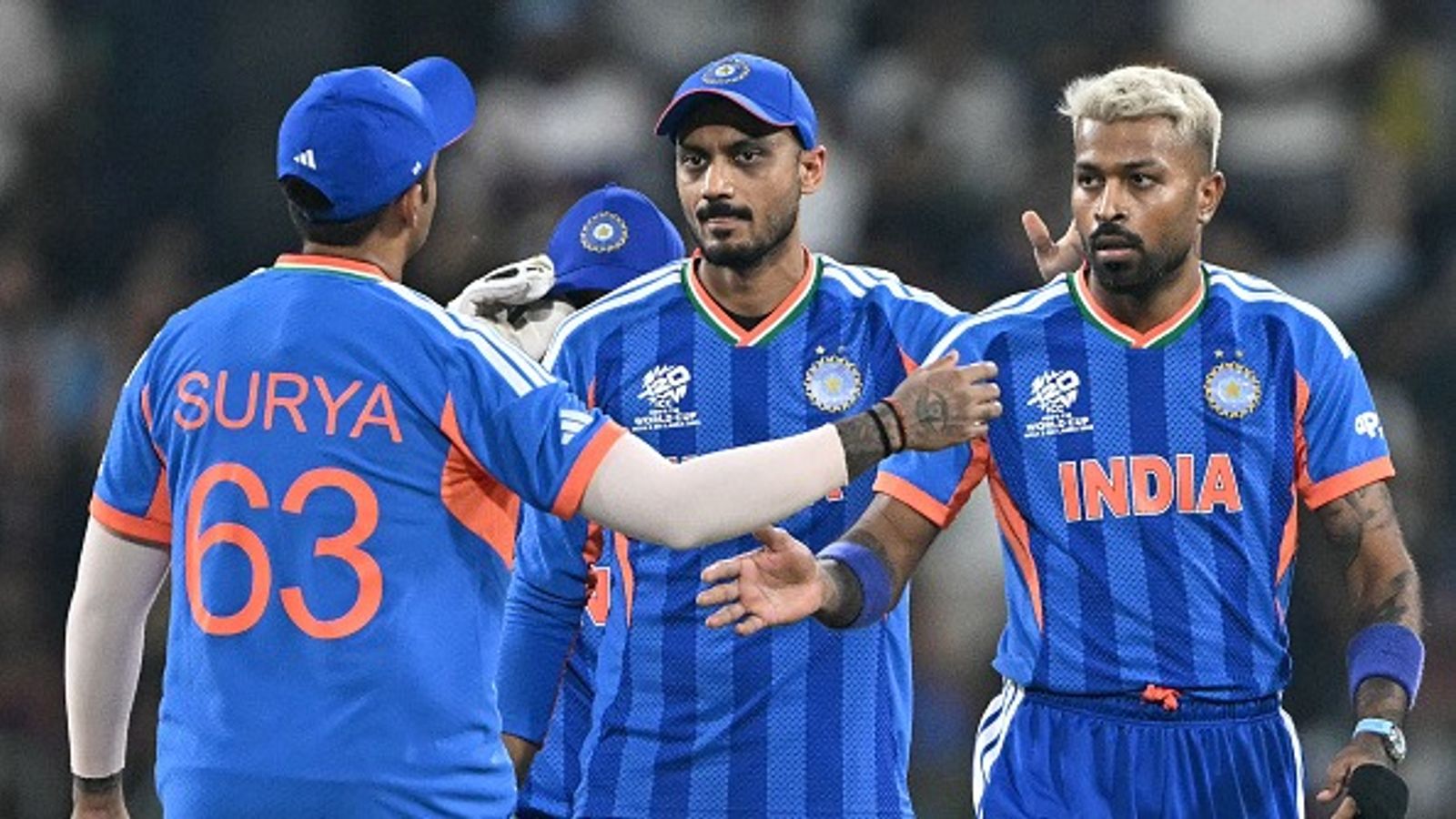 T20 World Cup 2026: India’s super eight fixtures, dates and match venues revealed Hardik Pandya (R) celebrates with Axar Patel (C) and captain Suryakumar Yadav after taking the wicket of Pakistan's Sahibzada Farhan during the 2026 ICC Men's T20 Cricket World Cup (Getty)
