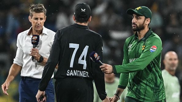 Pakistan's captain Salman Agha (R) shakes hands with New Zealand's skipper Mitchell Santner in frame. (Getty)