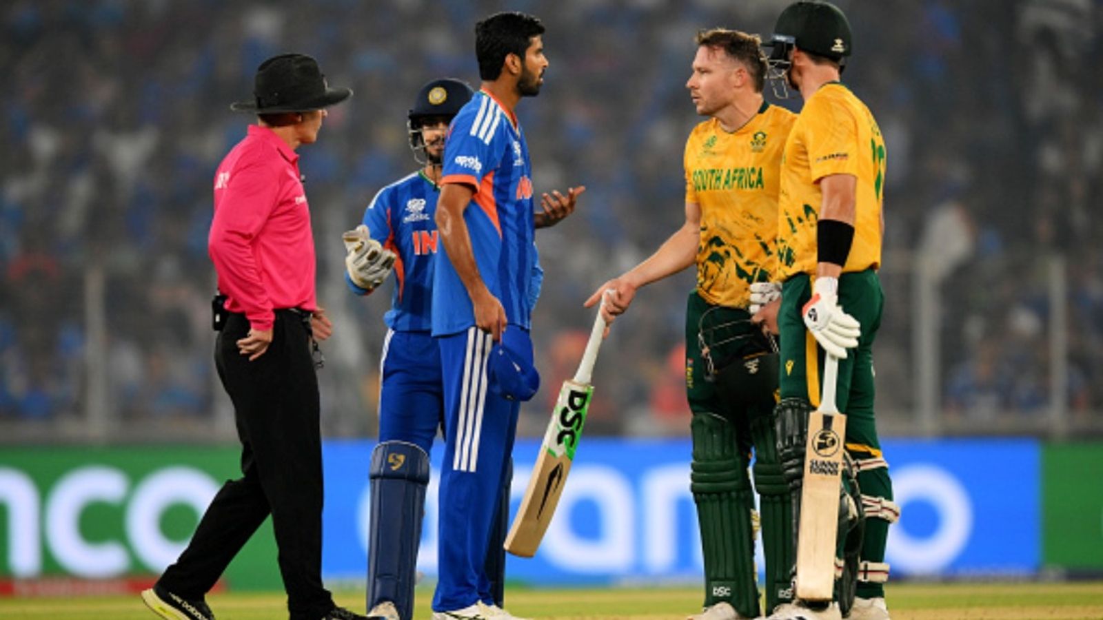 Washington Sundar & David Miller involved in heated altercation, umpires intervene; watch video Washington Sundar of India speaks to David Miller and Tristan Stubbs of South Africa during the ICC Men's T20 World Cup 2026 Super 8 match at Narendra Modi Stadium on February 22, 2026 in Ahmedabad, India.