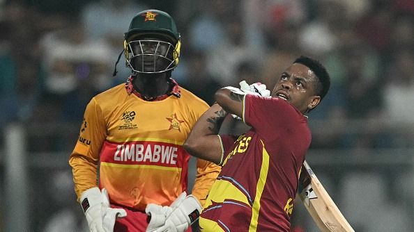 West Indies' Shimron Hetmyer (R) plays a shot as Zimbabwe wicketkeeper Tadiwanashe Marumani (L) looks on during the 2026 ICC Men's T20 Cricket World Cup Super Eights match between West Indies and Zimbabwe (Getty)