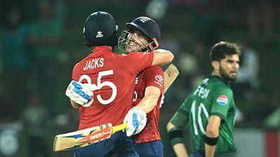 Harry Brook’s blazing ton powers England into T20 World Cup 2026 semifinals, Pakistan on brink of exit England captain Harry Brook (C) is congratulated by teammate Will Jacks (L) following his century (100 runs) during the 2026 ICC Men's T20 Cricket World Cup Super Eights match between England (Getty)