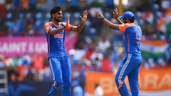 Arshdeep Singh of India celebrates with teammate Jasprit Bumrah (Getty)