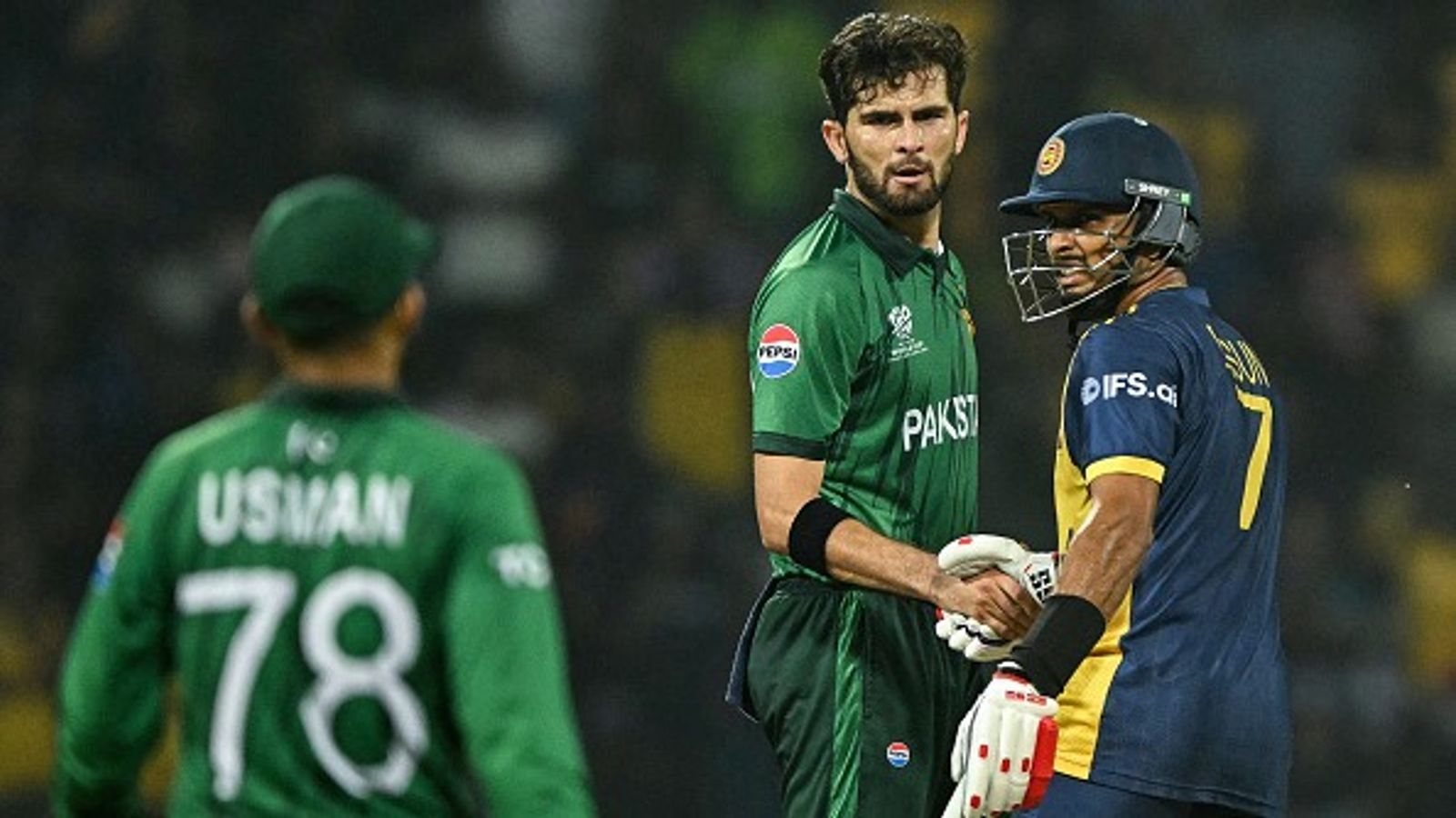 Five-run win not enough as Pakistan eliminated from T20 World Cup despite thriller against Sri Lanka Pakistan's Shaheen Shah Afridi (C) shakes hands with Sri Lanka's captain Dasun Shanaka in this frame. (Getty)