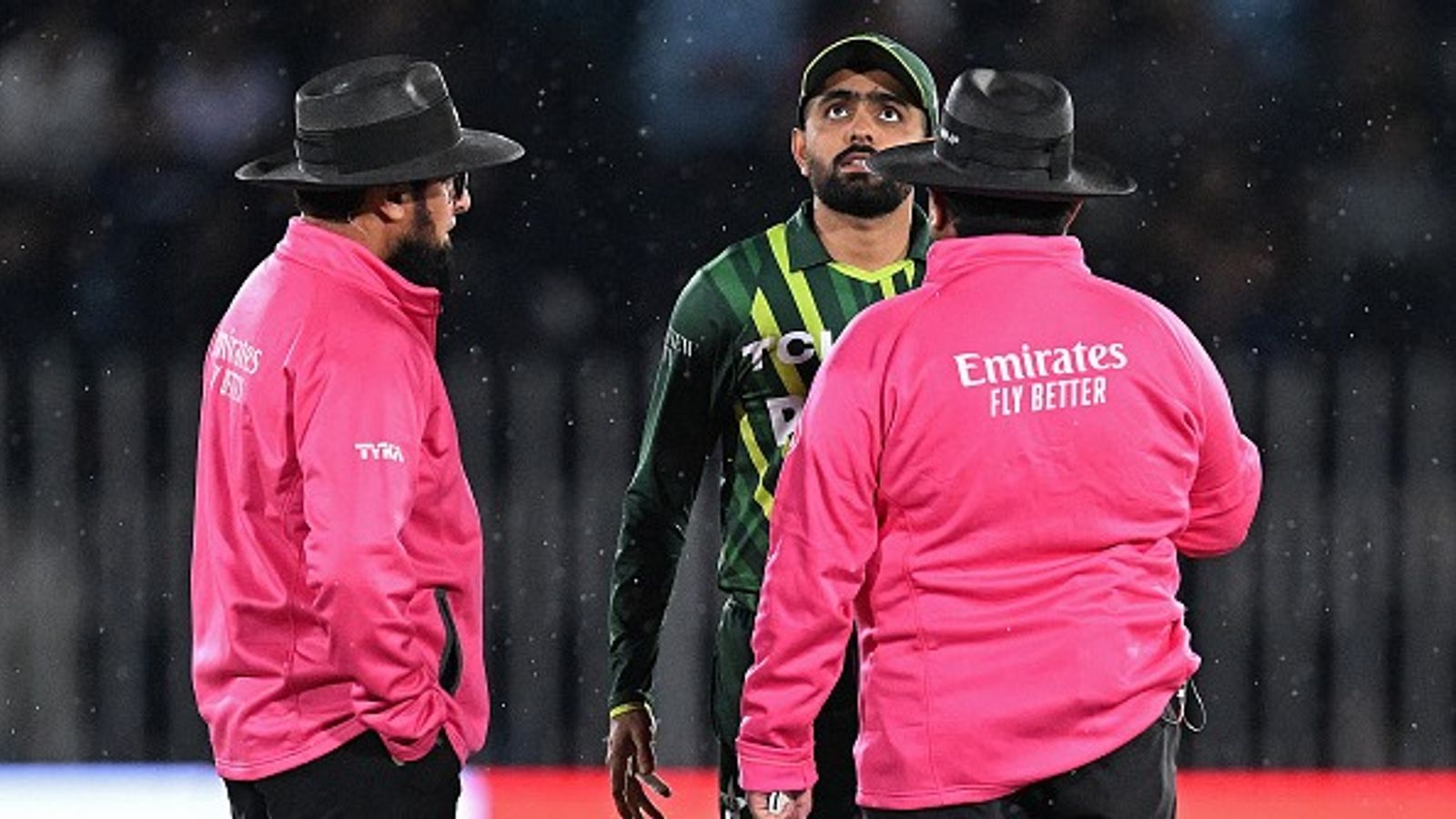 Big resignation shakes up Pakistan cricket after Salman Agha's brigade's T20 World Cup 2026 exit Former Pakistan's captain Babar Azam (C) speaks with match umpires Ahsan Raza (R) and Aleem Dar in this frame. (Getty)