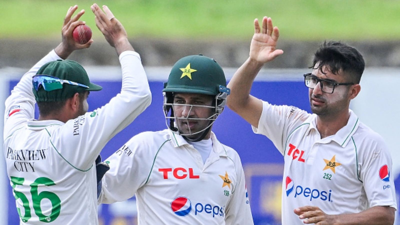 PCB set to appoint ex-Pakistan skipper Sarfaraz Ahmed as head coach of this format after T20 World Cup 2026 horror show Pakistan's Abrar Ahmed (R) celebrates with captain Babar Azam (L) and Sarfaraz Ahmed after taking the wicket of Sri Lanka's Ramesh Mendis during the second day of the first Test at the Galle International Cricket Stadium in Galle on July 17, 2023.