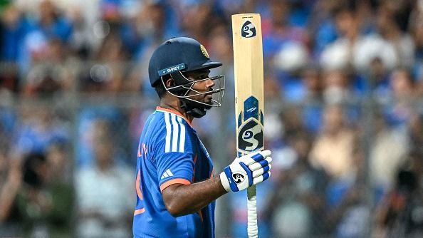  Sanju Samson acknowledges spectators as he walks back to the pavilion after his dismissal during the 2026 ICC Men's T20 Cricket World Cup semi-final match between India and England (Getty)