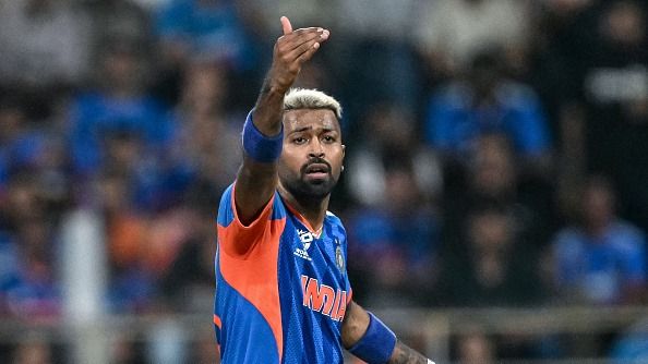 India's Hardik Pandya arranges the field during the 2026 ICC Men's T20 Cricket World Cup semi-final match between India and England at the Wankhede Stadium in Mumbai on March 5, 2026. 