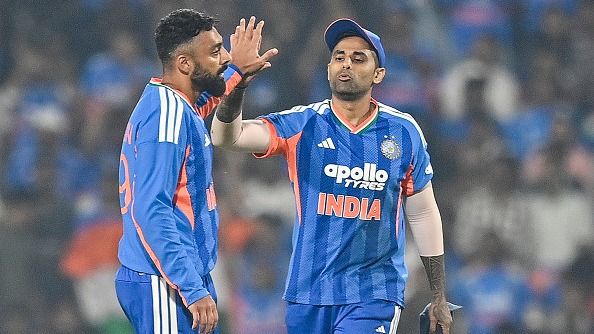 India's Varun Chakravarthy (L) celebrates with captain Suryakumar Yadav in this frame. (Getty)