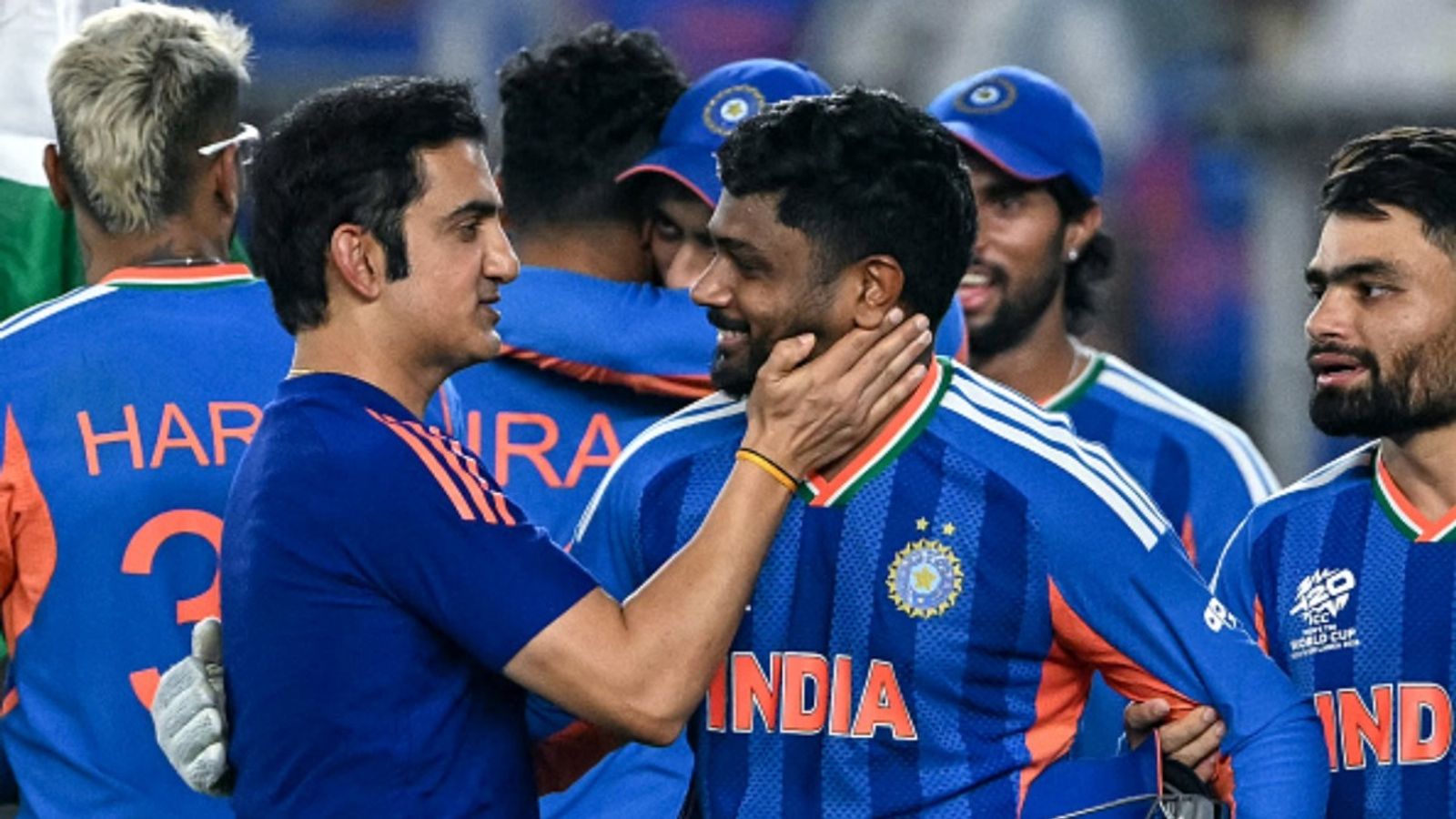 'Imagine if Sanju had been playing for a milestone': Gambhir reveals dressing room's mindset which led to 250 becoming common India's Sanju Samson (C) celebrates with his coach Gautam Gambhir (L) after their team's win in the 2026 ICC Men's T20 World Cup final against New Zealand at the Narendra Modi Stadium in Ahmedabad on March 8, 2026.