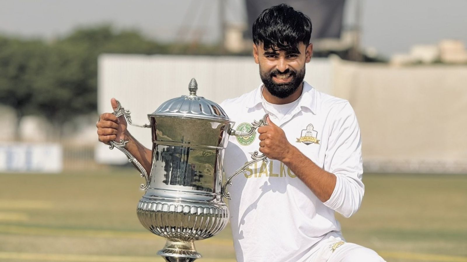 Benched for 40 games in a row, Pakistan's 24-yr-old cricketer announces retirement alleging 'corruption' in selection Sialkot's Shahzaib Bhatti poses with Quaid-e-Azam Trophy 2024-25.