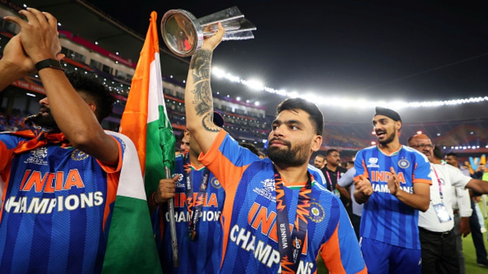 'Aapne sikhaya tha ki farz sabse aage hai': Rinku Singh pens emotional tribute for late father after T20 World Cup 2026 triumph Rinku Singh of India celebrates with the trophy following the ICC Men's T20 World Cup 2026 final against New Zealand at Narendra Modi Stadium on March 08, 2026 in Ahmedabad, India.