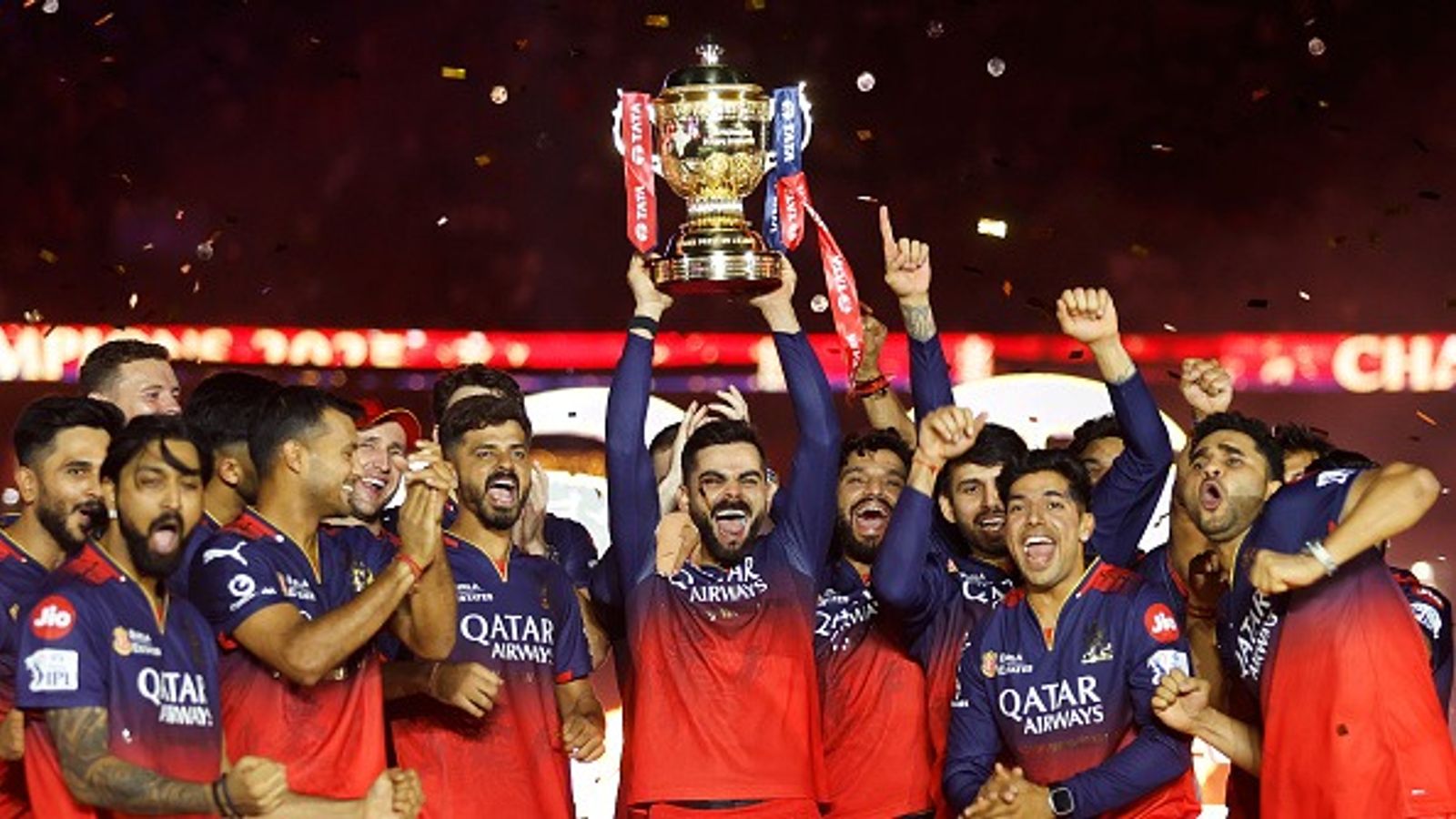 IPL 2026: How many home games will RCB play at M Chinnaswamy Stadium? Check details Virat Kohli of Royal Challengers Bengaluru lifts the IPL trophy alongside teammates following the team's victory in the 2025 IPL Final match between Royal Challengers Bengaluru and Punjab Kings (Getty)