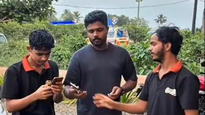 WATCH: Sanju Samson clicks selfies with fans at Kerala shop days after T20 World Cup triumph Sanju Samson clicking selfies with fans (X)