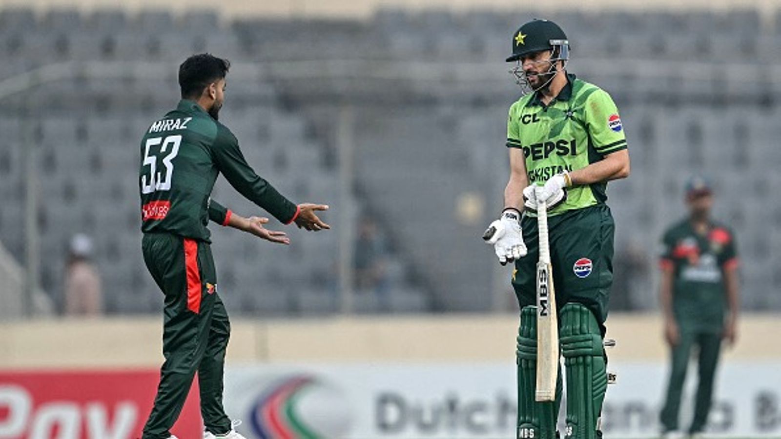 Watch: Big fight erupts, Salman Agha loses cool after school-boy-error leads to bizarre run-out Pakistan's Salman Agha (R) speaks with Bangladesh's captain Mehidy Hasan Miraz in this frame. (Getty)