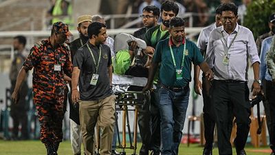 Scary scenes! Pakistani batter stretchered off the field after serious injury vs Bangladesh, rushed to hospital Pakistan's Hussain Talat (C) is taken off the field using a stretcher after getting injured while fielding during 2nd ODI vs Bangladesh. (Getty)