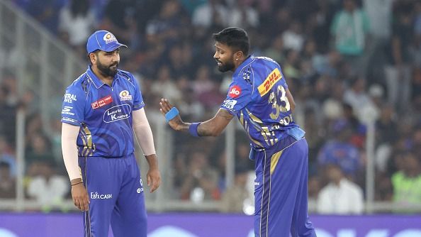 ohit Sharma of Mumbai Indians and Hardik Pandya of Mumbai Indians interact during the 2025 IPL match between Gujarat Titans and Mumbai Indians (Getty)