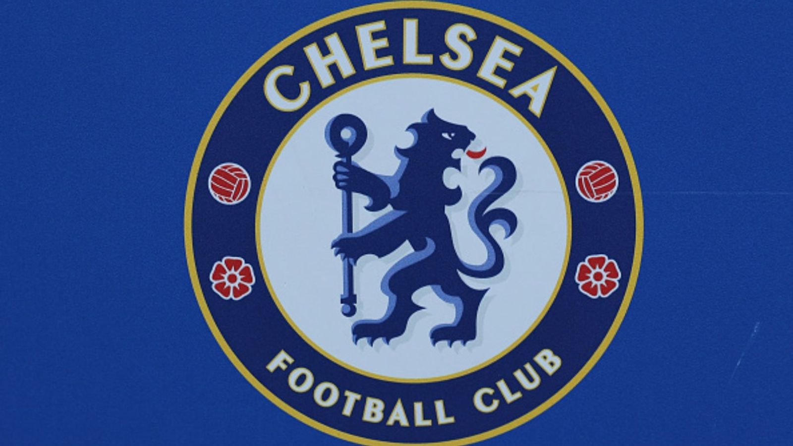 Chelsea fined £10.75 m by Premier League along with one-year transfer ban Chelsea logo in the frame (Image via Getty)