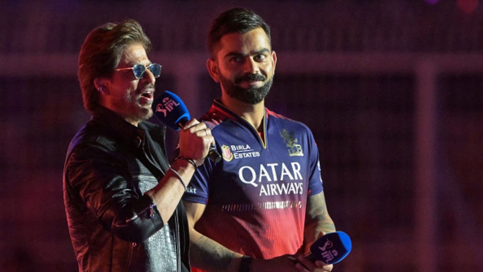 BCCI cancels IPL 2026 opening ceremony days before RCB vs SRH encounter, here's why Bollywood actor Shah Rukh Khan (L) speaks as RCB's Virat Kohli watches during the opening ceremony of the IPL before the start of match between KKR and RCB at the Eden Gardens in Kolkata on March 22, 2025.