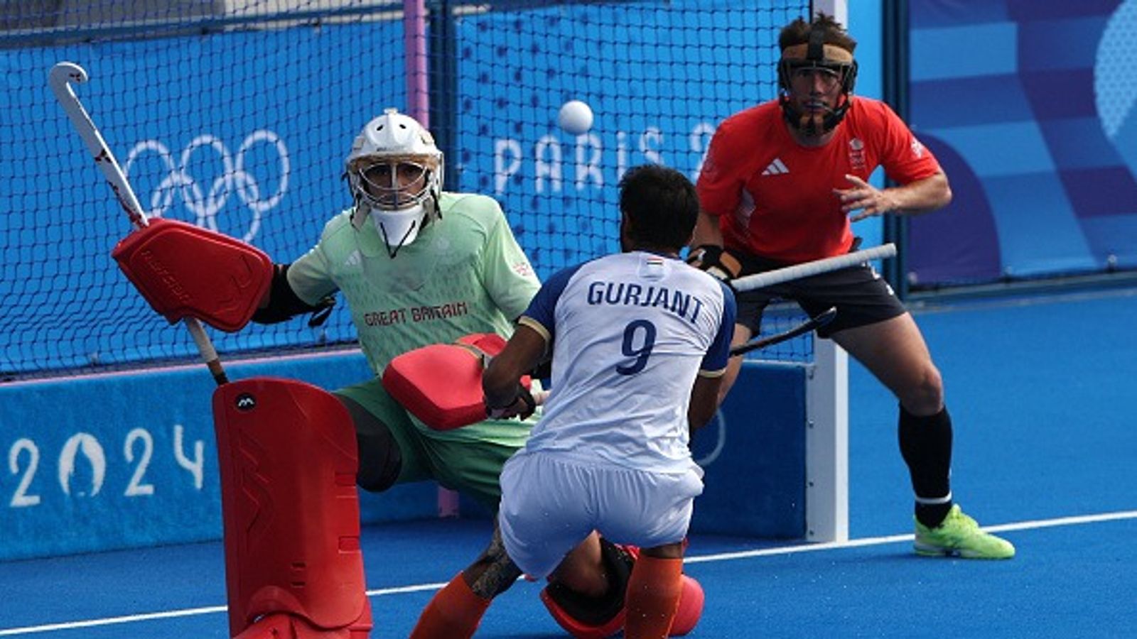 India's hockey double Olympic medallist announces retirement Oliver Payne fights for the ball with India's forward #09 Gurjant Singh in the men's quarter-final field hockey match between India and Britain during the Paris 2024 Olympic Games