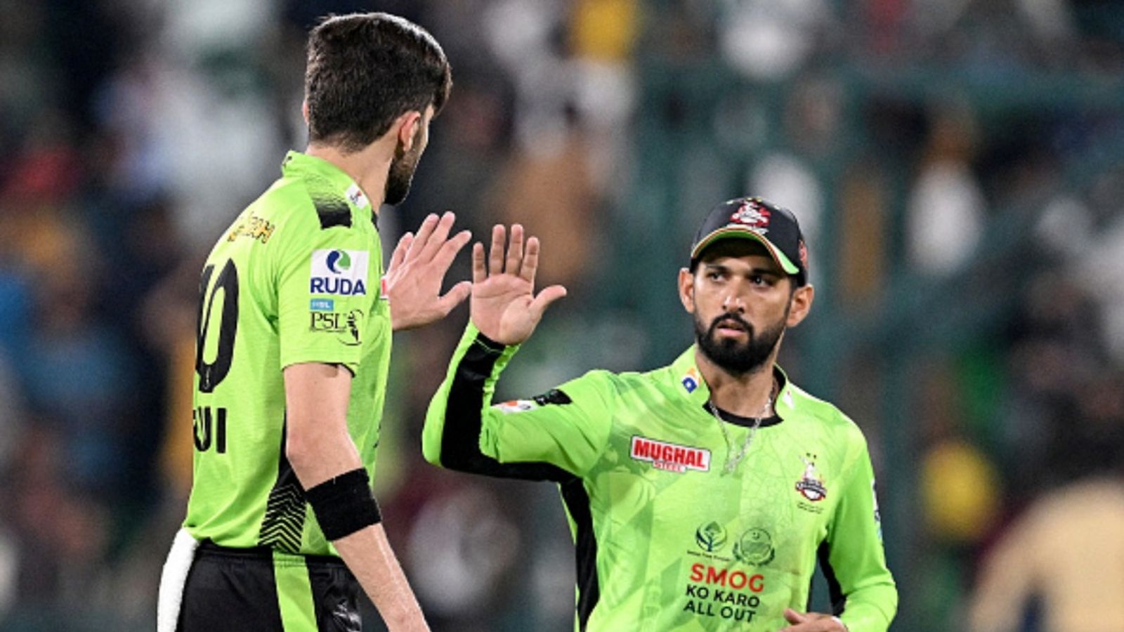 Shaheen Afridi, Sikandar Raza breach security protocols by hosting 4 guests till 1:25 AM in hotel, Police informs PSL CEO & PCB Lahore Qalandars' captain Shaheen Shah Afridi (L) celebrates with Sikandar Raza after taking a wicket.