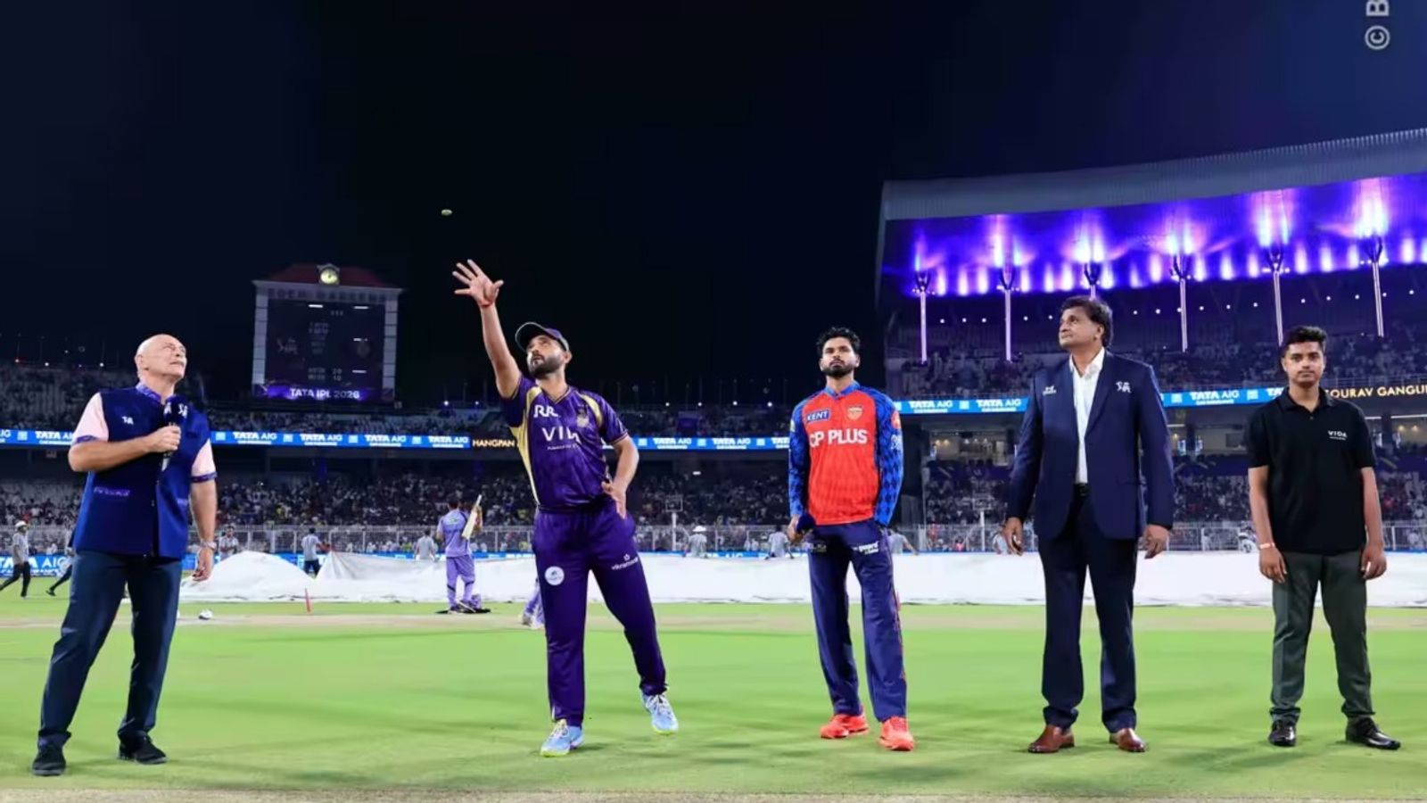 'Interesting thought process': R Ashwin questions Ajinkya Rahane's decision to bat first despite rain forecast KKR skipper Ajinkya Rahane flips the coin at the toss as PBKS' Shreyas Iyer looks on.