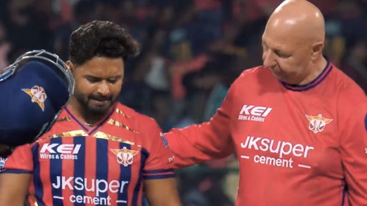 Teary eyed Rishabh Pant with LSG Physio (X) Teary eyed Rishabh Pant with LSG Physio (X)