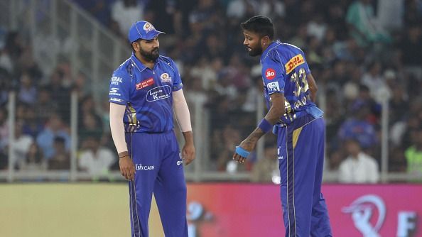 Mumbai Indians urged to strip Hardik Pandya of captaincy, bring back Rohit Sharma after crushing loss to PBKS ohit Sharma of Mumbai Indians and Hardik Pandya of Mumbai Indians interact (Getty)